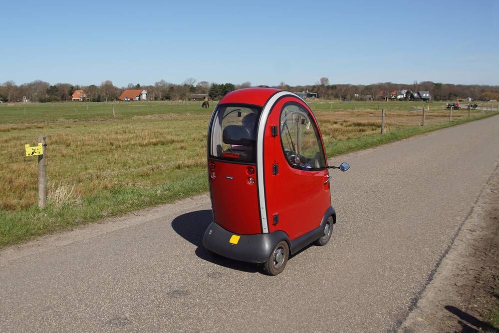red fully enclosed mobility scooter