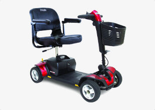 Black and red mobility scooter with a basket on a white background